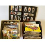 2 TINS OF CIGARETTE CARDS SOME IN BOOKS AND A VINTAGE FOLDER OF CIGARETTE PICTURES
