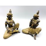 A pair of Southeast Asian brass and bronzed figures of Hindu deity, modelled playing a flute and