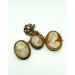 Two gold mounted oval Cameo brooches with a gold mounted cameo pendant