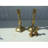 A PAIR OF VINTAGE BRASS CANDLESTICKS AND 2 SMALLER ONES