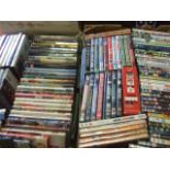 2 BOXES OF DVDS