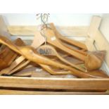 COLLECTION OF WOODEN ITEMS TI INCLUDE VINTAGE COAT HANGERS ETC