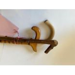 A group of three vintage walking canes?sticks, one knobbled hedgerow?