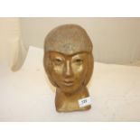 CLAY HEAD OF A WOMAN PAINTED GOLD