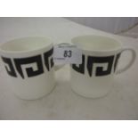 PAIR OF SUSIE COOPER FOR WEDGEWOOD KEYSTONE BLACK ON WHITE ESPRESSO CANS, HAIRLINE CRACK ON ONE