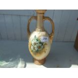A VICTORIAN PAINTED HANDLED VASE
