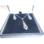 SILVER AND MARCASITE KNOTWORK DESIGN PENDANT AND MATCHING EARRINGS
