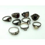 Nine Silver rings of various styles