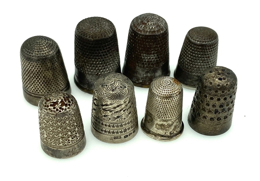 Eight vintage silver and silver plated thimbles