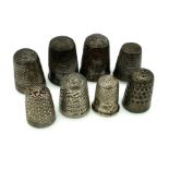 Eight vintage silver and silver plated thimbles