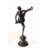 A Bruno Zack bronze female ballet dancer with raised leg on a turned black slate socle plinth 53cm