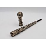 Siam silver umbrella handle and silverplate walking cane top in the shape of a boy's head