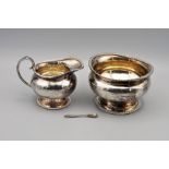 Three pieces of silver plate-ware: creamer, sugar bowl and mustard/salt spoon