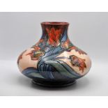 Moorcroft vase approx. 10cm high - note: slight crack showing on the side - no break A/F