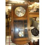 Enfield Oak Cased Wall Clock with key & pendulum 29 x 12 1/2 inches