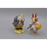 Beswick Beatrix Potter Figurines 'Mrs Rabbit' (BP2a - gold oval first version with umbrella out) and