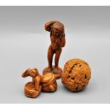 A CARVED WALNUT PLUS 2 JAPANESE WOOD CARVINGS OF NUDES SIGNED?