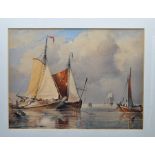 A framed seascape watercolur of French barges loading glazed in gilt frame 42cm x 36cm