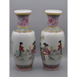 A pair of Japanese Satsuma vases of baluster form, with pictorial decoration, depicting Geisha Girls