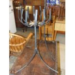 2 Wrought Iron Pot Stands one 25 inches tall other 34