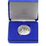 A ROYAL MINT 2006 'HER MAJESTY QUEEN ELIZABETH II EIGHTIETH BIRTHDAY' SILVER PROOF CROWN, with COA/