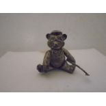 WHITE METAL JOINTED GOLF PLAYING BEAR