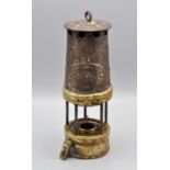 A W E Teale & Co Ltd of Swinton No. 4, copper and brass miners safety lamp, glass is missing