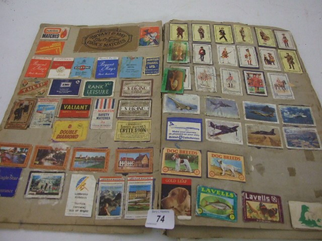 QUANTITY OF COLLECTABLE MATCHBOX FRONTS IN A SCRAP BOOK APPORX 12 FULL PAGES