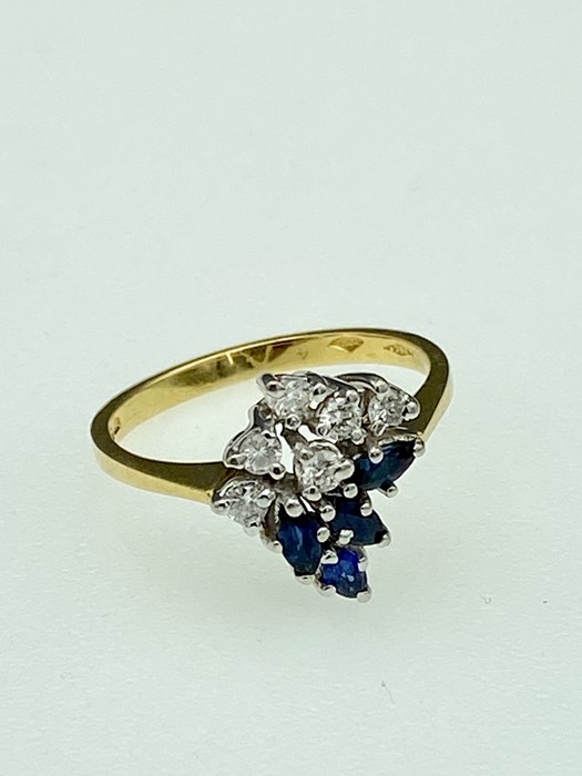 An 18ct (.750) gold sapphire & diamond ring