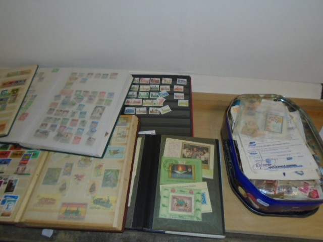 TIN OF LOOSE STAMPS AND 5 STOCK BOOKS OF STAMPS TO INCLUDE GERMANY, JAPAN AND SOUTH AFRICA