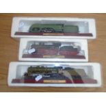 3 BOXED MODEL TRAINS ON WOODEN PLINTHS