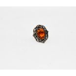 A Mark Kostiak of Wales, Amber & Sterling Silver ring