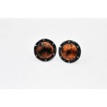 A Pair of arts & craft style cufflinks, pewter & copper