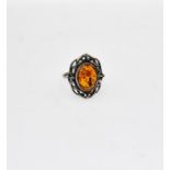 A Mark Kostiak of Wales, Amber & Sterling Silver ring in box