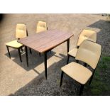 4 retro dining chairs in the style of elliots of Newbury and extending rectangular dining table with
