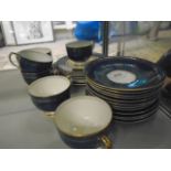Part tea matching service of plates, cups and saucers in blue and gold