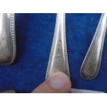 4 Silver dessert spoons plus 3 others and 2 teaspoons, all matching with reed edge, 219g
