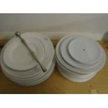 A set of near matching white dinner bowls 11" and 5 side plates and 11 11" plates and a 3 tier
