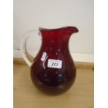 A quality ruby red jug with clean handles CR 9"