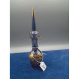 Blue coloured glass bottle ? Venisia with applied 'gold' and enamel with pointed stopper. 10"