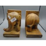 Pair of book-ends wood carved in form of Elephants 7 1/2"