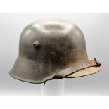 A German WWI MI6 helmet, with inner leather liner