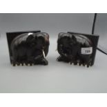 Pair of book-ends ebony in form of Elephants. 4 1/4" tall