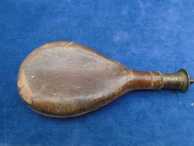 Leather and brass powder flask (has come away at the seam) and one other leather powder flask - Image 3 of 3