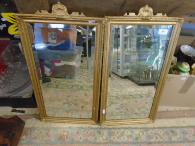 Pair of bevel edged wall mirrors in gilt frames, 13.5" x 24"