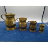 Set of 4 'coppered' brass graduated mugs