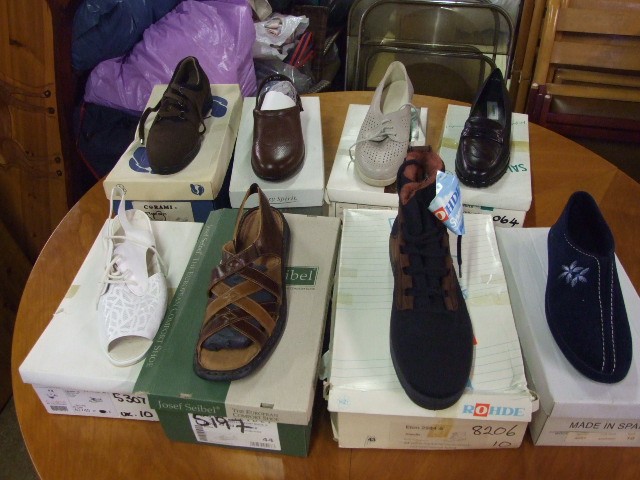 8 Pairs of assorterd footwear 6 size 10 one 10 1/2 and one 44 ( mostly new some lightly worn )