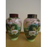 Pair of Ovid vases decorated with trees and flowers.