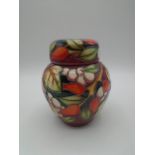 Moorcroft Pottery ginger jar and cover decorated in the Winter Harvest pattern designed by Sian