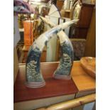 Pair of decorative horns on wooden bases